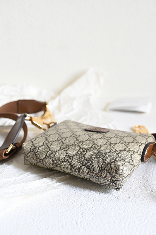 Handle and strap detail of chic statement women's handbag – women's designer-style accessory