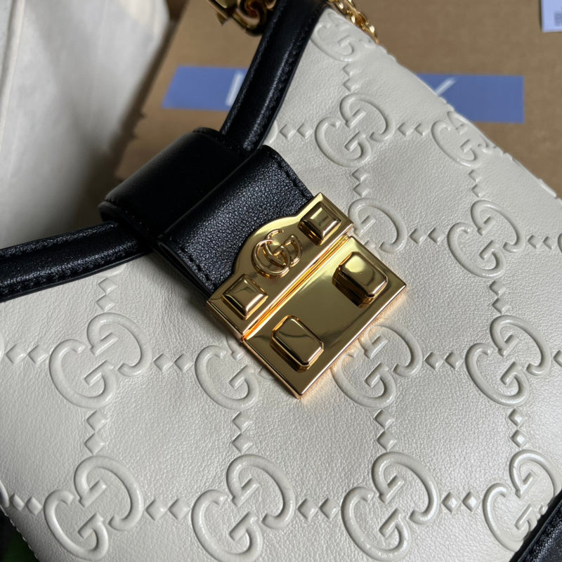 Side profile of classic everyday-luxe women's handbag – women's designer-style accessory