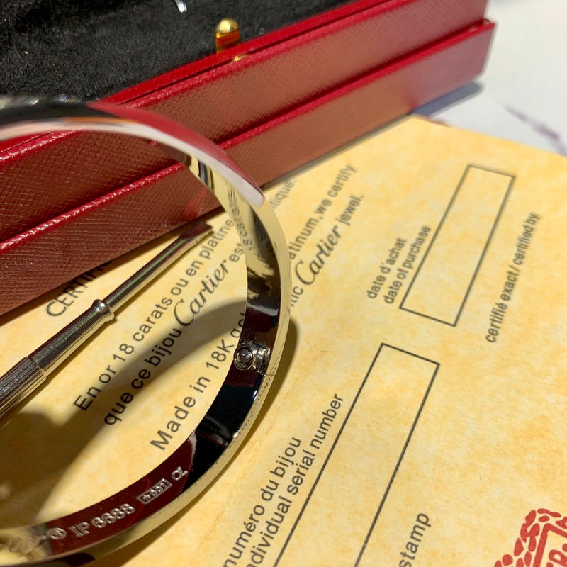 Close-up detail view of Cartier unisex jewelry piece