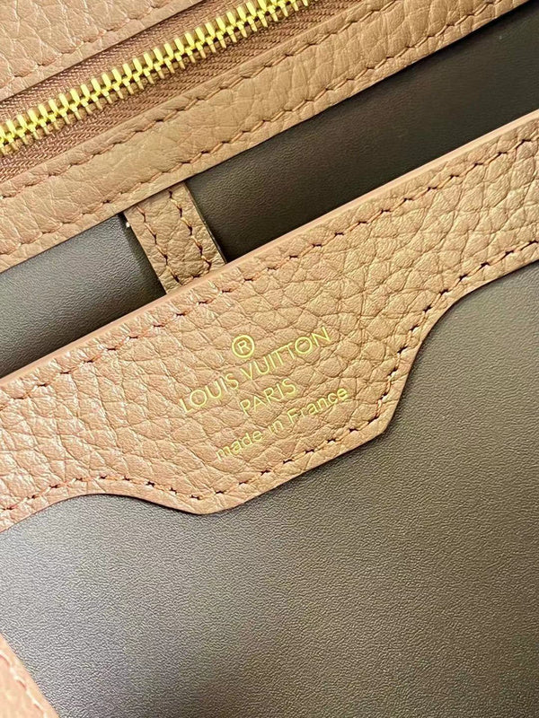 Side profile of premium signature women's handbag – women's designer-style accessory