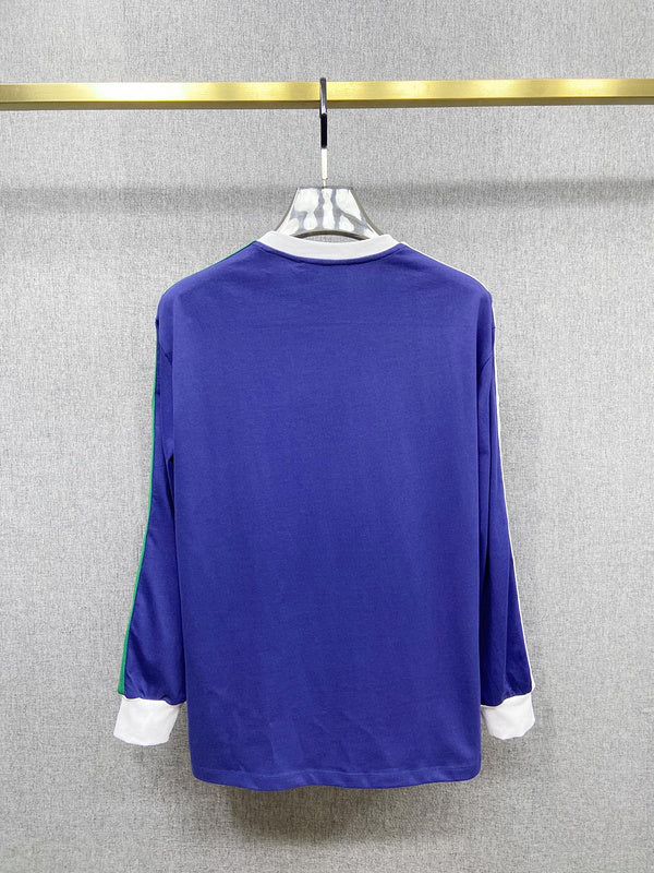 Side profile of Gucci luxury clothing with logo-detail design