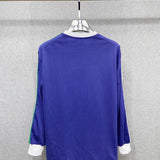 Side profile of Gucci luxury clothing with logo-detail design