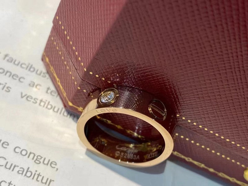 Side view of Cartier unisex jewelry piece