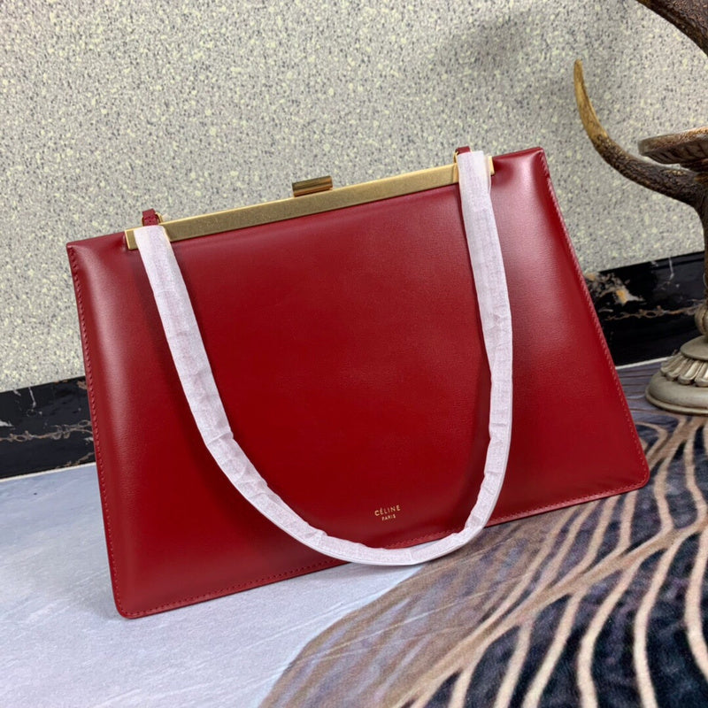 Front view of chic sleek women's handbag – women's luxury accessory