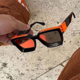 Lifestyle view of Louis Vuitton unisex sunglasses