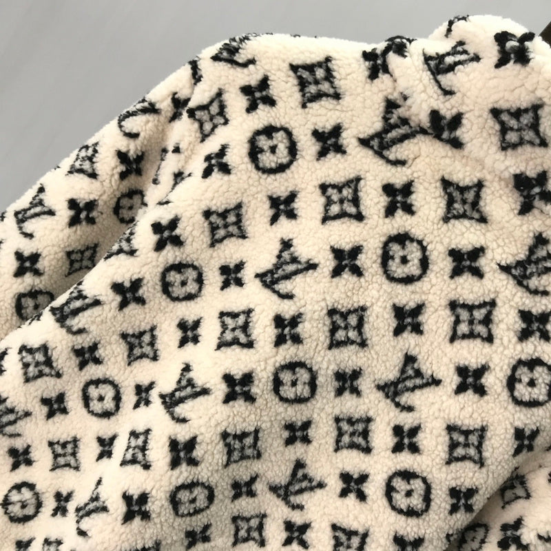 Front view of Louis Vuitton luxury clothing with logo-detail design