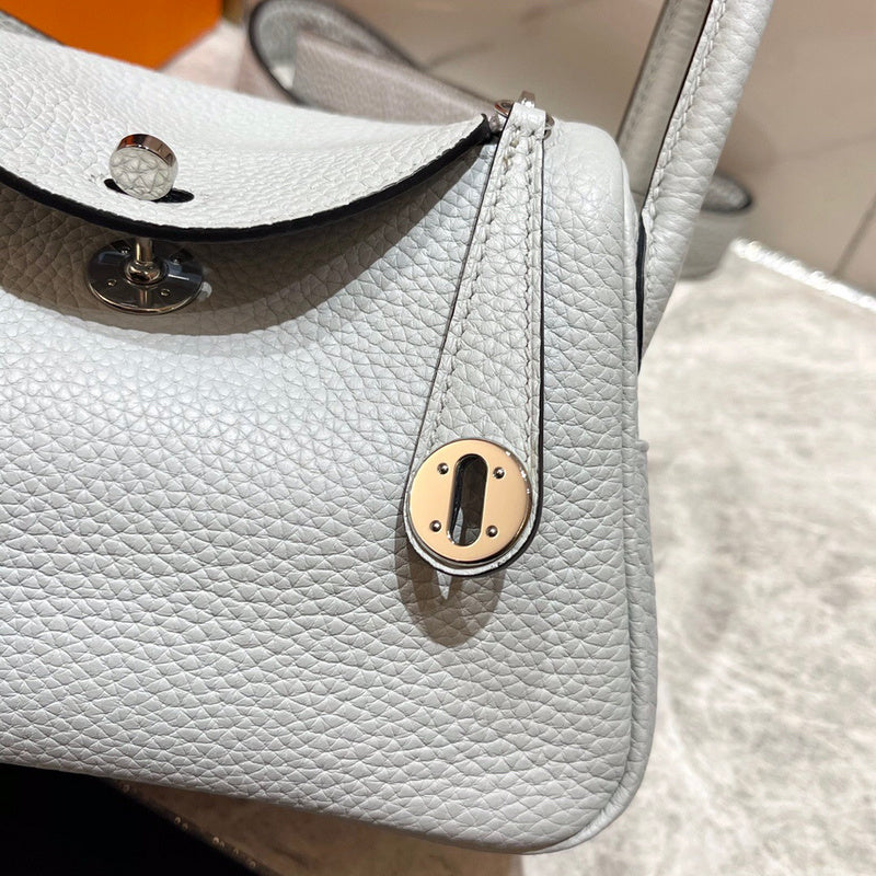 Side view of tailored structured handbag