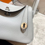 Side view of tailored structured handbag