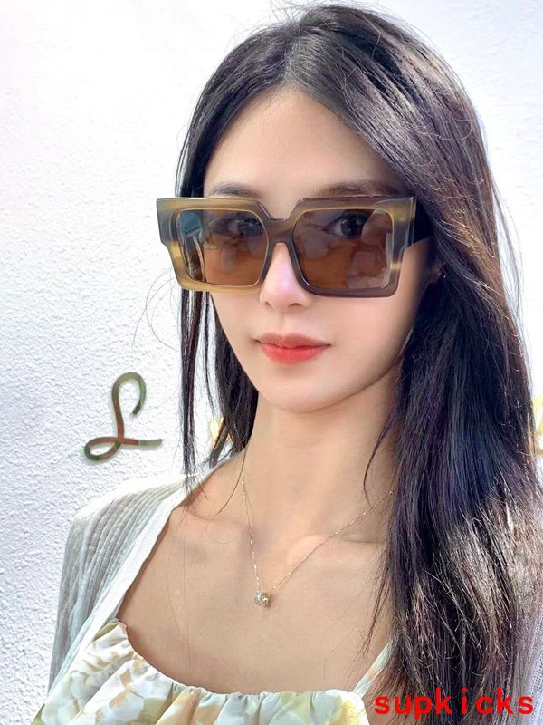 Lifestyle view of Louis Vuitton unisex sunglasses