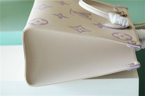  Tailored top-handle bag carried on shoulder