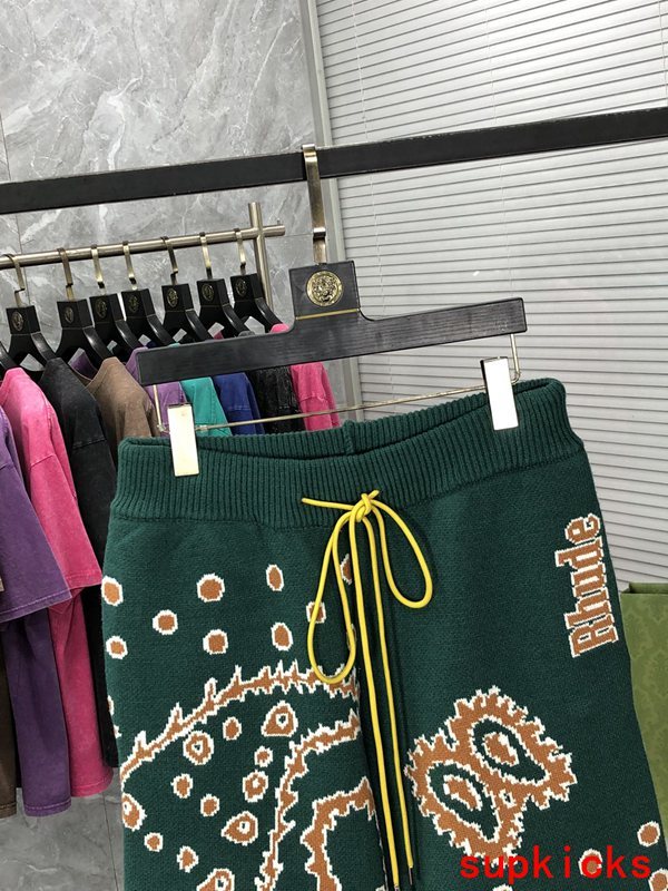 Close-up detail shot of Rhude luxury clothing with contemporary cut