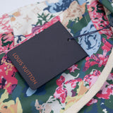 Flat lay presentation of Louis Vuitton luxury clothing with runway-inspired design