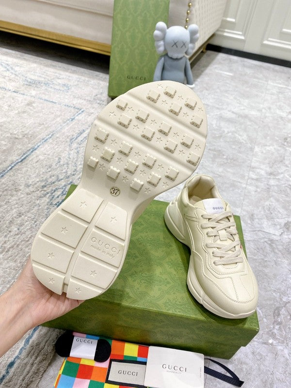 Side profile of Gucci muted earth tones sneakers cushioned comfort fit