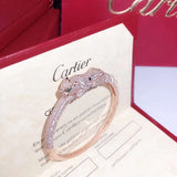 Close-up detail view of Cartier unisex jewelry piece
