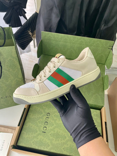 Gucci two-tone luxury sneakers view 11 signature lace-up style