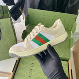 Gucci two-tone luxury sneakers view 11 signature lace-up style