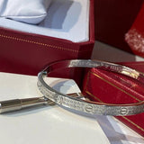 Front view of Cartier unisex jewelry piece