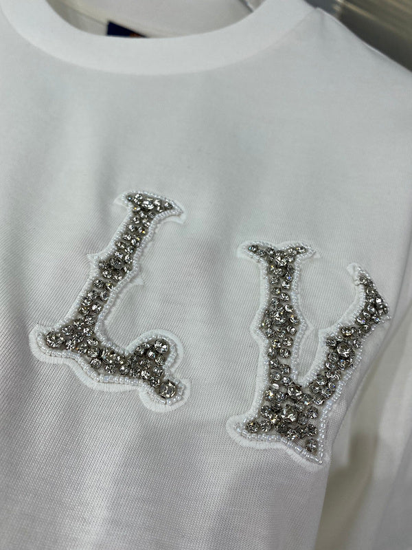 Full styled look of Louis Vuitton cotton t-shirt with streetwear-inspired cut