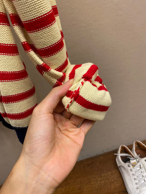 Front view of Gucci luxury clothing with label-forward styling