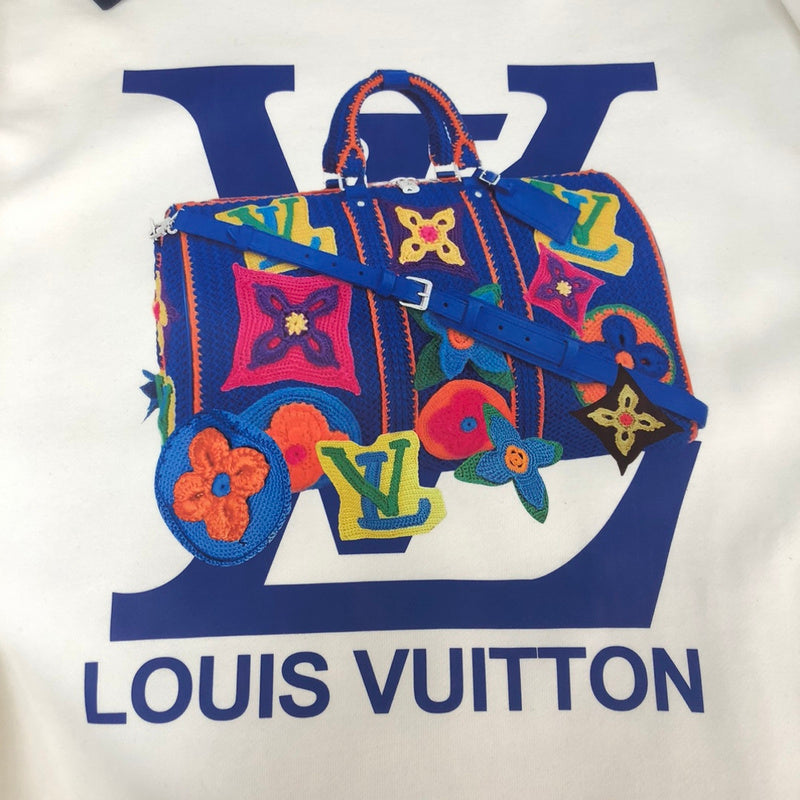 Full styled look of Louis Vuitton luxury clothing with signature branding