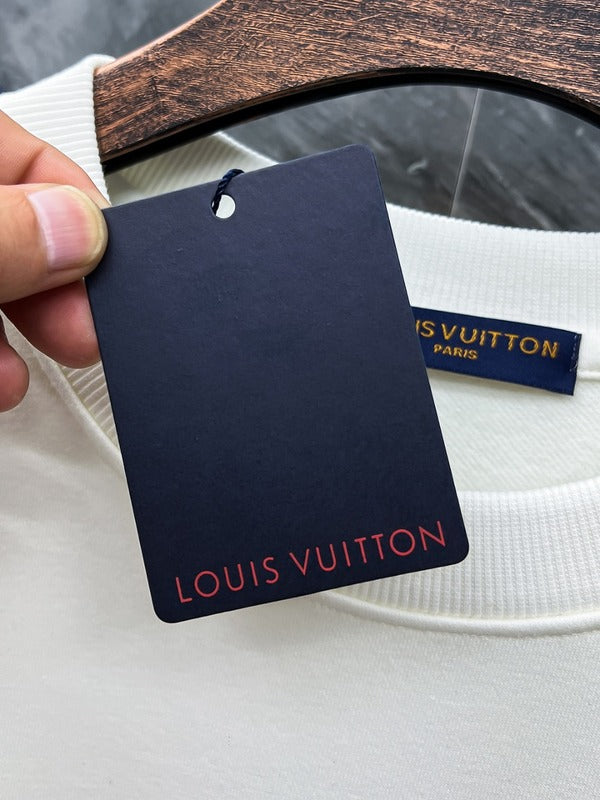 Close-up detail shot of Louis Vuitton luxury clothing with tailored silhouette