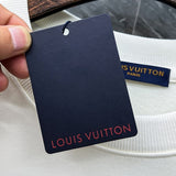 Close-up detail shot of Louis Vuitton luxury clothing with tailored silhouette