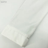 Close-up detail shot of Louis Vuitton luxury clothing with everyday silhouette