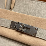 Side view of curated structured handbag