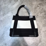 Statement Faux Leather Handbag - Smooth Faux-Leather Exterior | Women's Fashion Handbag #764 - back view (image 4) of designer-inspired handbag