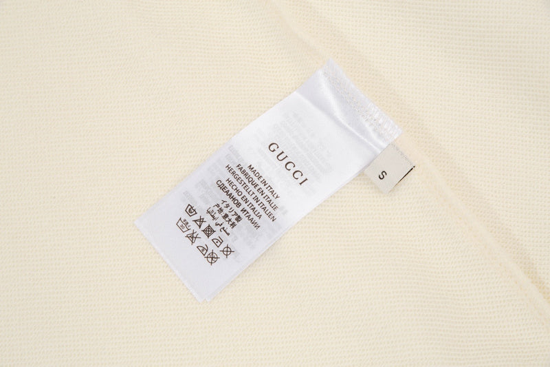 Close-up detail shot of Gucci luxury clothing with streetwear-inspired cut