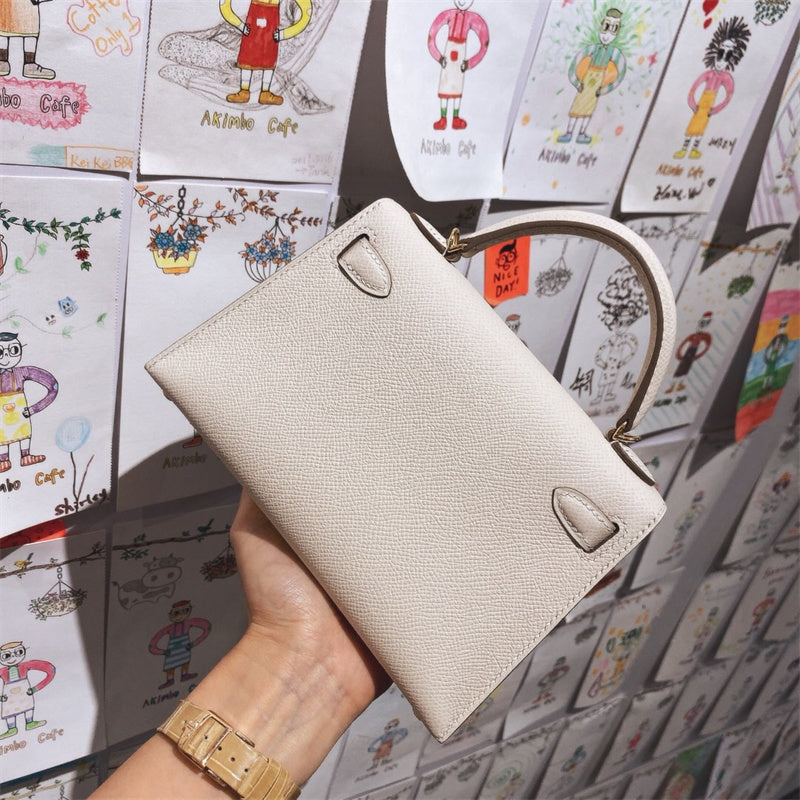 Side view of tailored structured handbag