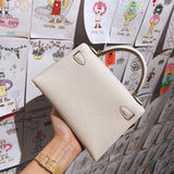 Side view of tailored structured handbag