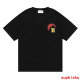 Side profile of Rhude luxury clothing with streetwear-inspired cut