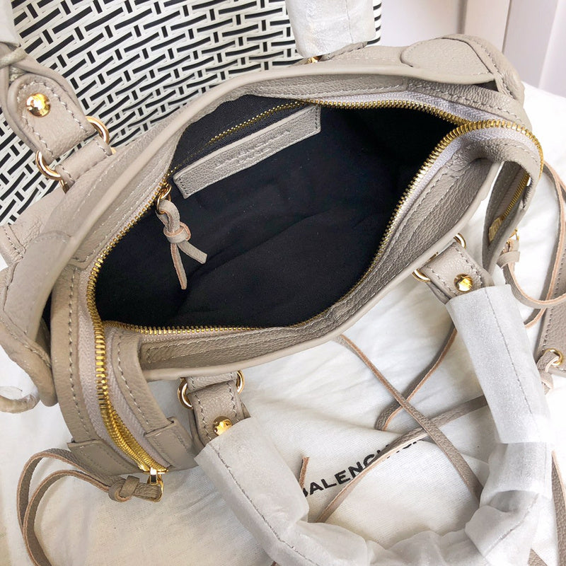 Side profile of polished classic women's handbag – women's luxury accessory