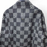 Close-up detail shot of Louis Vuitton luxury clothing with contemporary cut