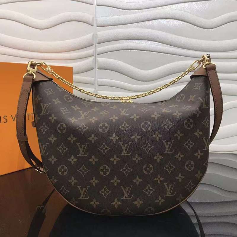 Styled lifestyle shot of modern signature women's handbag – women's designer-style accessory