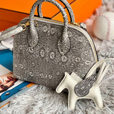  Essential tote bag carried on shoulder
