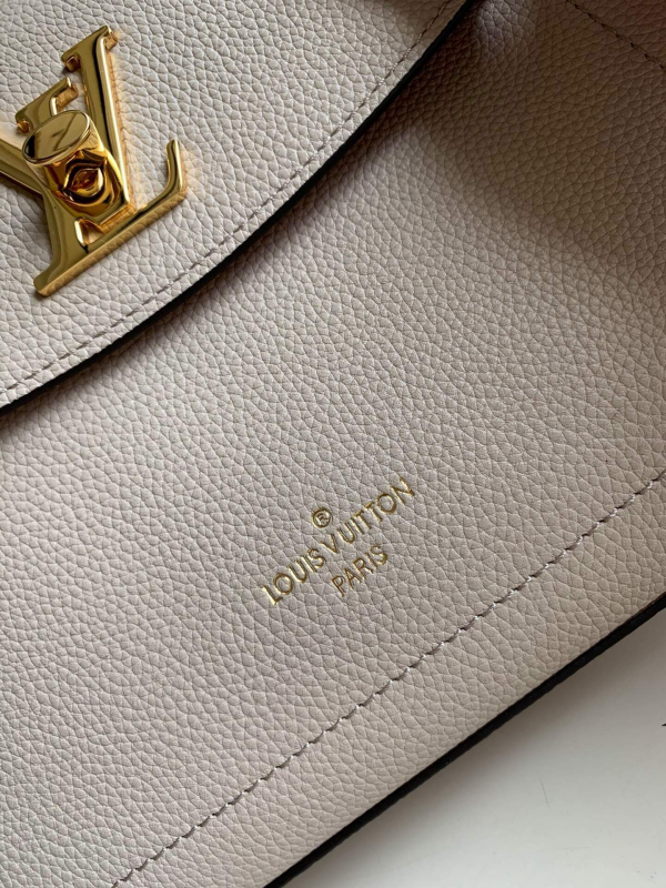 Close-up detail of modern sleek women's handbag – women's statement bag