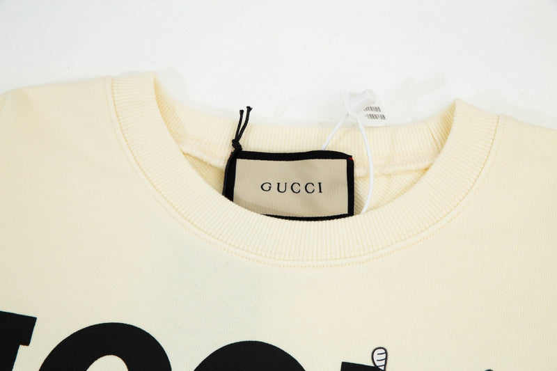 Close-up detail shot of Gucci luxury clothing with tailored silhouette