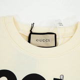 Close-up detail shot of Gucci luxury clothing with tailored silhouette