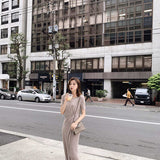 Side view of understated structured handbag
