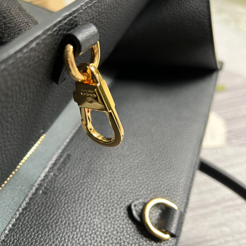 Side profile of sleek classic women's handbag – women's premium purse