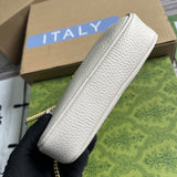 Handle and strap detail of structured polished women's handbag – women's statement bag