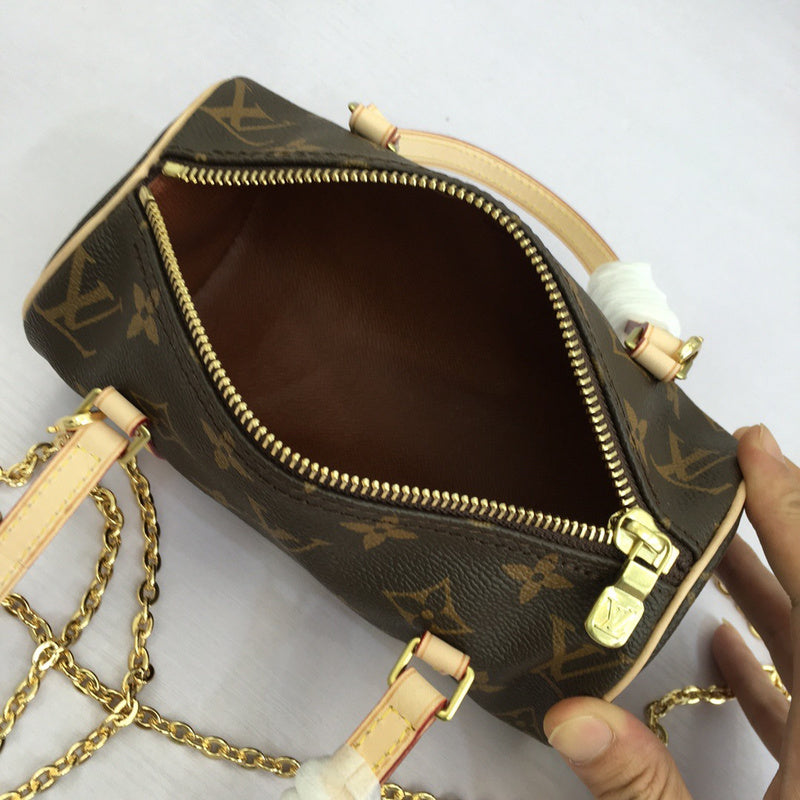 Top view of polished signature women's handbag – women's luxury accessory
