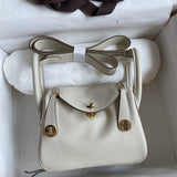 Side view of polished structured handbag
