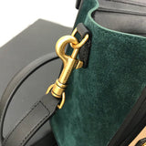 Handle and strap detail of refined sleek women's handbag – women's designer-style accessory