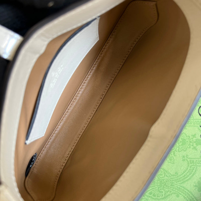 Close-up detail of polished premium women's handbag – women's luxury accessory