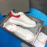 Alexander McQueen Streetwear sneakers in neutral cream minimalist modern build front view