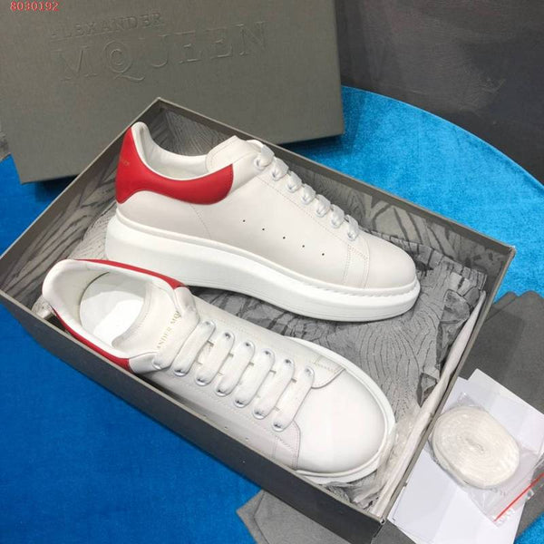 Alexander McQueen Streetwear sneakers in neutral cream minimalist modern build front view
