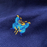 Close-up detail shot of Louis Vuitton luxury clothing with signature branding